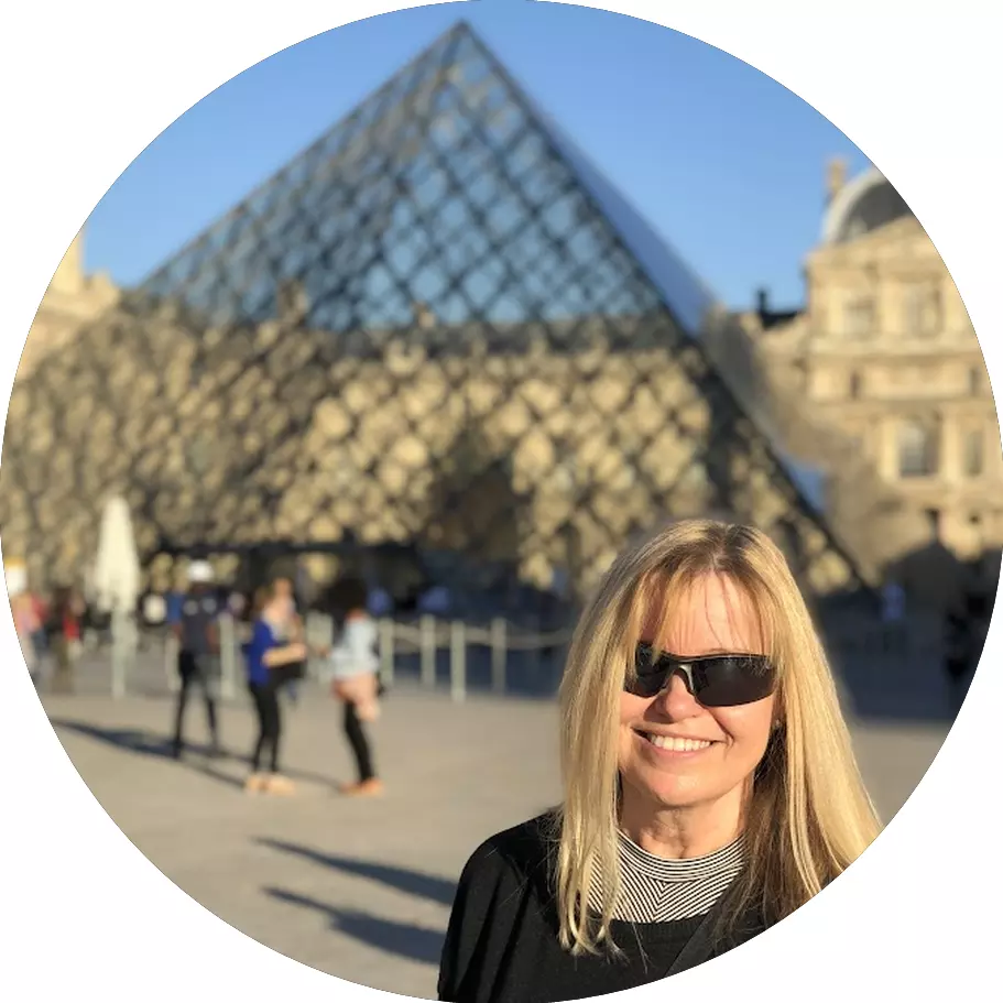 Small group tour in Paris with travelers near Eiffel Tower and historic landmarks